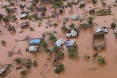 Houses in a flooded area of Buzi, central Mozambique, on March 20, 2019, after the passage of cyclone Idai. International aid agencies raced on March 20 to rescue survivors and meet spiralling humanitarian needs in three impoverished countries battered by one of the worst storms to hit southern Africa in decades. Five days after tropical cyclone Idai cut a swathe through Mozambique, Zimbabwe and Malawi.Photo by ADRIEN BARBIER / AFP