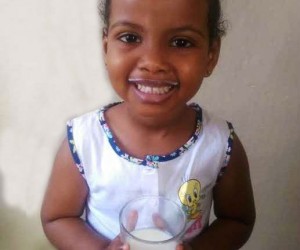 A Somali child loving her milk every morning